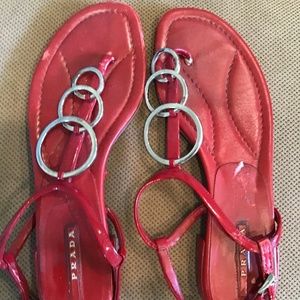 Red Prada sandals